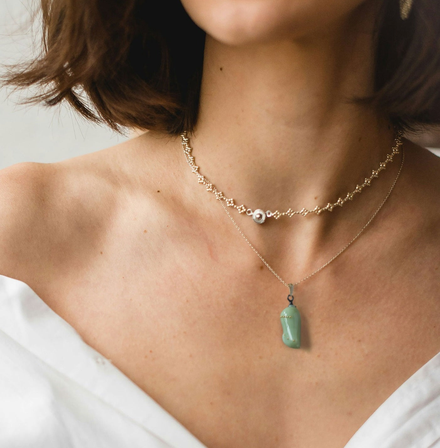 Jade-colored Monarch chrysalis replica, art glass and 24k gold
